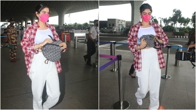 Khushi opted for a white strappy crop top with gathered sides and matching comfy joggers. She layered her ensemble with a checkered, oversized boyfriend shirt, which she left open on the front.  (Varinder Chawla)