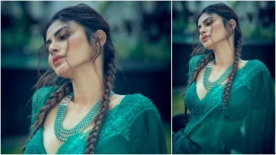 Mouni Roy is the epitome of royalty and elegance in this lehenga. With minimal makeup and hair braided into two, Mouni grabbed eye balls with her look. (Instagram/@imouniroy)