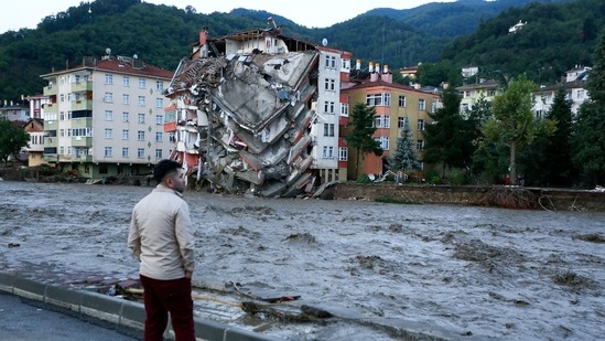 Heavy rains late Tuesday produced flash floods that turned streets into running rivers and sparked mudslides that buckled roads in three northern regions. In picture - Flood waters in Bozkurt town of Kastamonu province, Turkey.(AP) Heavy rains late Tuesday produced flash floods that turned streets into running rivers and sparked mudslides that buckled roads in three northern regions. In picture - Flood waters in Bozkurt town of Kastamonu province, Turkey.(AP)