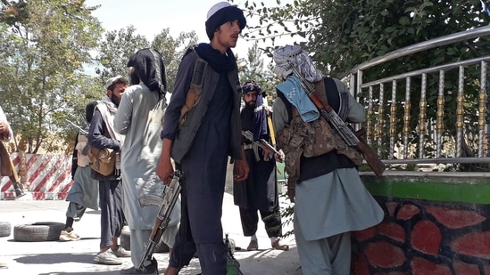 Taliban fighters stand along the roadside in Ghazni as the Taliban move closer to the Afghan capital after taking Ghazni city.(AFP) Taliban fighters stand along the roadside in Ghazni as the Taliban move closer to the Afghan capital after taking Ghazni city.(AFP)