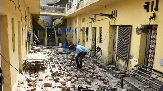 Owners of the three adjoining buildings that were damaged after the two-storeyed building collapse on Ludhiana’s RK Road have sought compensation for the damage to their property and goods. (Gurpreet Singh/HT) Owners of the three adjoining buildings that were damaged after the two-storeyed building collapse on Ludhiana’s RK Road have sought compensation for the damage to their property and goods. (Gurpreet Singh/HT)