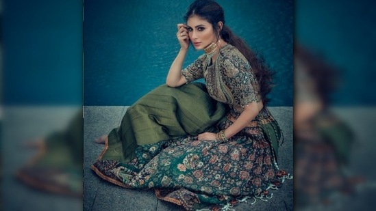 Earlier, Mouni Roy posed in an embellished emerald green lehenga for a wedding magazine photoshoot.(Instagram/@imouniroy)
