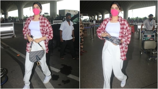 Khushi wore the uber-chic outfit with matching sneakers, a Christian Dior saddlebag, a dainty chain, and a quirky bracelet. She tied her locks in a messy bun and chose to flaunt her natural glow. (Varinder Chawla)