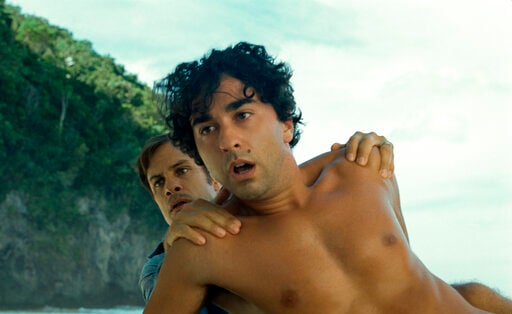 This image released by Universal Pictures shows Gael García Bernal, left, and Alex Wolff in a scene from Old.(AP)