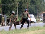 Security personnel during an encounter with terrorists after they opened fire at a Border Security Force (BSF) convoy in Kulgam district on Thursday. (PTI) Security personnel during an encounter with terrorists after they opened fire at a Border Security Force (BSF) convoy in Kulgam district on Thursday. (PTI)