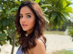 Jasmin Bhasin could only react with a smile at the kissing incident.