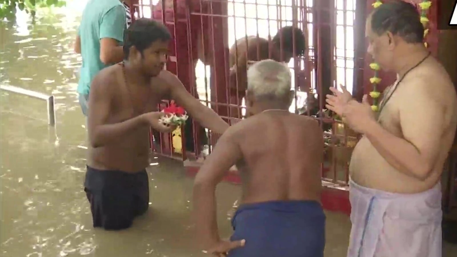 People offer Naag Panchami prayers in thigh-deep water in Bihar