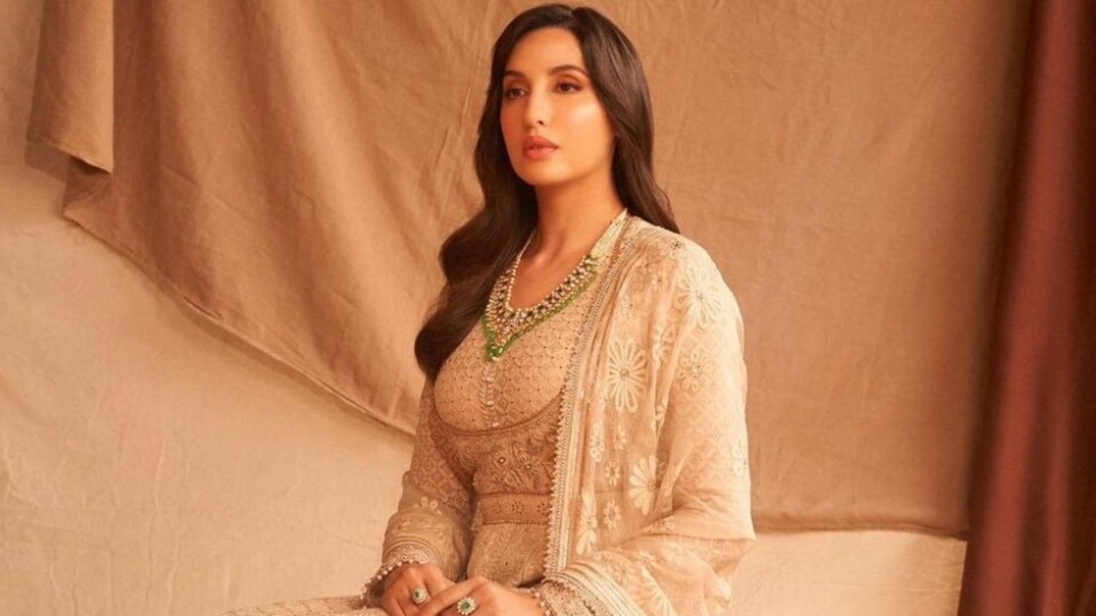 Nora Fatehi in ₹3 lakh ivory anarkali set looks like royalty as she  promotes Bhuj