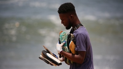 "This is the rubbish people have thrown into the sea and the sea brings it back to us because it doesn't want it," Kouame told Reuters. (REUTERS)