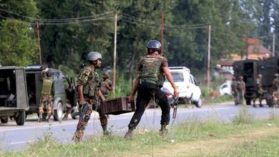 Security personnel during a gunfight with militants after they opened fire at a Border Security Force convoy in Kulgam district on Thursday, August 12. (PTI) Security personnel during a gunfight with militants after they opened fire at a Border Security Force convoy in Kulgam district on Thursday, August 12. (PTI)