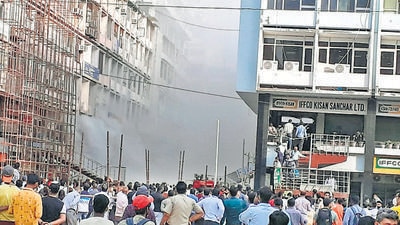 A fire breaks out in the first floor of a building reportedly due to short circuit in electric board at Nehru Place, in New Delhi on Thursday. HC said the presence of encroachments hampered fire fighting efforts. (ANI) A fire breaks out in the first floor of a building reportedly due to short circuit in electric board at Nehru Place, in New Delhi on Thursday. HC said the presence of encroachments hampered fire fighting efforts. (ANI)