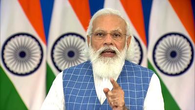 Prime Minister Narendra Modi addresses the Investors Summit in Gujarat through video conferencing, in New Delhi on Friday. (ANI)