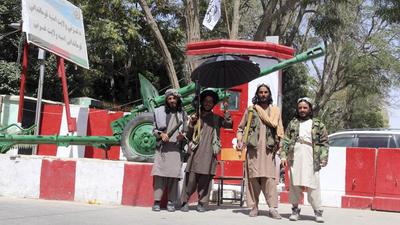 Taliban fighters stand guard inside the city of Ghazni, southwest of Kabul, Afghanistan on Friday. The Taliban have completed their sweep of the country‚ as they took four more provincial capitals in a lightning offensive that is gradually encircling Kabul, just weeks before the US is set to officially end its two-decade long war. (AP PHOTO.)