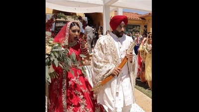Shared by aperinastudios on Instagram, the video shows the bride and groom reacting to the photographer's fall. (Instagram/@aperinastudios) Shared by aperinastudios on Instagram, the video shows the bride and groom reacting to the photographer's fall. (Instagram/@aperinastudios)