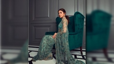 Anushka Sharma wore this gorgeous see-through green embellished Sabyasachi saree for Priyanka Chopra and Nick Jonas' wedding reception in Mumbai. (Instagram/@anushkasharma) Anushka Sharma wore this gorgeous see-through green embellished Sabyasachi saree for Priyanka Chopra and Nick Jonas' wedding reception in Mumbai. (Instagram/@anushkasharma)