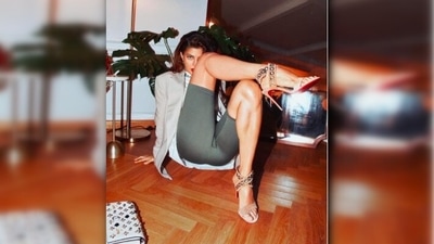 Jacqueline Fernandez accessorised her look with a golden watch, bracelets and a blue purse with stones. (Instagram/@leepakshiellawadi) Jacqueline Fernandez accessorised her look with a golden watch, bracelets and a blue purse with stones. (Instagram/@leepakshiellawadi)