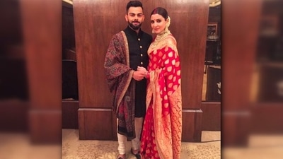 For her wedding reception in Delhi, Anushka Sharma wanted to go for a traditional look and wore a stunning red and gold Benarasi silk Sabyasachi saree. (Instagram/@alliaalrufai) For her wedding reception in Delhi, Anushka Sharma wanted to go for a traditional look and wore a stunning red and gold Benarasi silk Sabyasachi saree. (Instagram/@alliaalrufai)