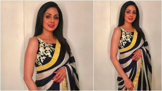 Not everyone can rock stripes but Sridevi made jaws drop when she wore this beautiful Manish Malhotra’s dual-toned saree. She teamed it with a black sleeveless blouse with silver and yellow embroidery.(Instagram/@sridevi.kapoor)