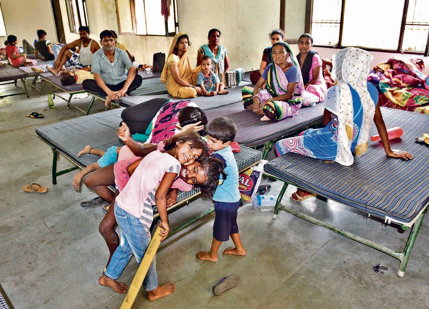 The labourers at MC night shelter near the factory site in Ludhiana on Friday. (Harsimar Pal Singh/HT) The labourers at MC night shelter near the factory site in Ludhiana on Friday. (Harsimar Pal Singh/HT)