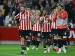 Brentford's Pontus Jansson celebrates with teammates after the match.