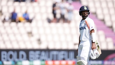 India's Cheteshwar Pujara walks after losing his wicket. (Action Images via Reuters)