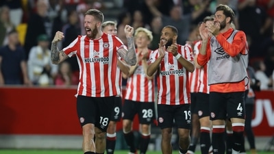 Brentford's Pontus Jansson celebrates with teammates after the match. (REUTERS)