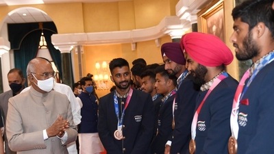 President Ram Nath Kovind interacts with the Indian contingent of the Tokyo Olympics 2020 at Rashtrapati Bhavan Cultural Centre, in New Delhi on Saturday.&nbsp; ((ANI Photo))