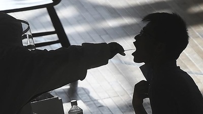 The Covid-19 virus first emerged in the Chinese city of Wuhan in late 2019 before spreading in and outside China, triggering the worst pandemic in a century. (AP file photo) The Covid-19 virus first emerged in the Chinese city of Wuhan in late 2019 before spreading in and outside China, triggering the worst pandemic in a century. (AP file photo)