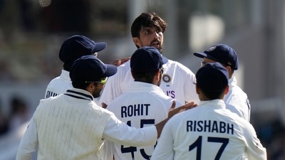 India's Ishant Sharma, centre rear, celebrates with teammates taking the wicket of England's Moeen Ali caught by India's Virat Kohli during the third day of the 2nd cricket test between England and India at Lord's cricket ground in London (AP) India's Ishant Sharma, centre rear, celebrates with teammates taking the wicket of England's Moeen Ali caught by India's Virat Kohli during the third day of the 2nd cricket test between England and India at Lord's cricket ground in London (AP)