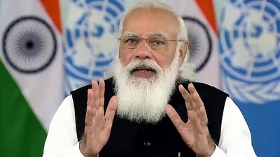 After the showering of the petals, PM Modi will address the nation. (ANI Photo) After the showering of the petals, PM Modi will address the nation. (ANI Photo)