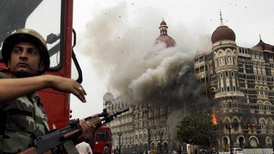 Smoke is seen billowing out of the ground and first floor of the Taj Hotel in south Mumbai during security personnel's "Operation Cyclone" following the 26/11 terror attacks in 2008. (PTI) Smoke is seen billowing out of the ground and first floor of the Taj Hotel in south Mumbai during security personnel's "Operation Cyclone" following the 26/11 terror attacks in 2008. (PTI)