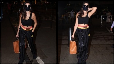 Nora opted for a comfy look in a sleeveless black tank top which she tied in a knot on the front. The top featured a scooped neckline and showed off her toned midriff. (Varinder Chawla) Nora opted for a comfy look in a sleeveless black tank top which she tied in a knot on the front. The top featured a scooped neckline and showed off her toned midriff. (Varinder Chawla)