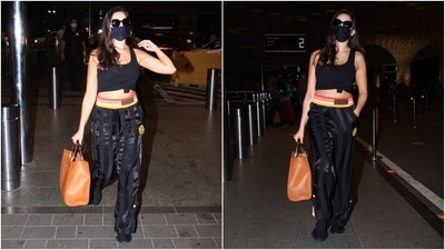 Nora left her tresses open with the jet-set ensemble. She also wore a black face mask to keep herself safe during the Covid-19 pandemic. (Varinder Chawla) Nora left her tresses open with the jet-set ensemble. She also wore a black face mask to keep herself safe during the Covid-19 pandemic. (Varinder Chawla)