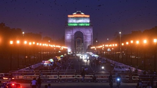 Illuminated view of India Gate on the eve of Independence Day at Vijay Chowk in New Delhi. (Sanchit Khanna/HT PHOTO)