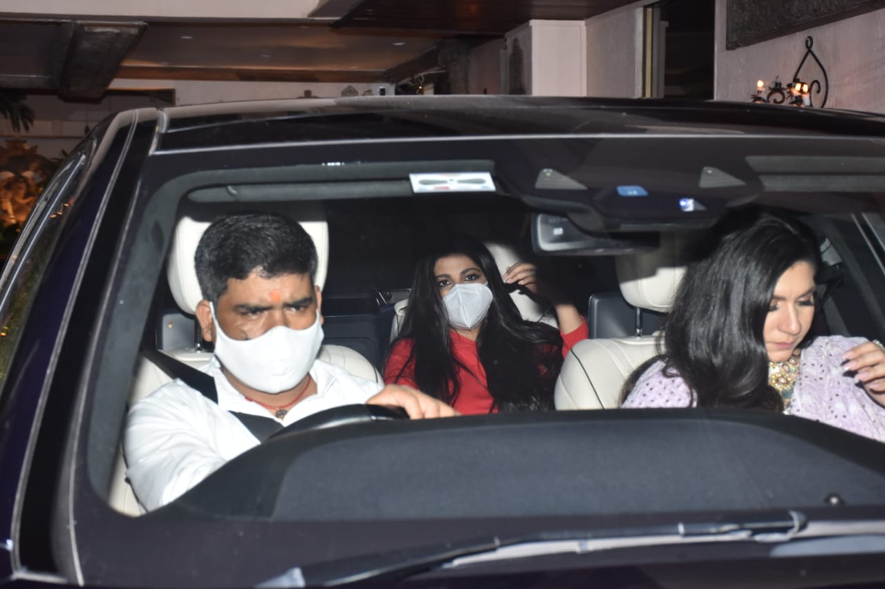 Rhea Kapoor wore a red outfit with a mask on her face. (Varinder Chawla)