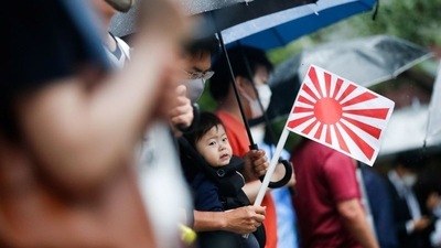 Amid Tokyo’s surging coronavirus infections, about 200 participants, reduced from about 6,000 before the pandemic, mourned for the dead with a minute of silence. Masks were required, and there was no singing of the national anthem. (REUTERS)