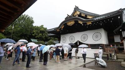 People practice social distancing while visiting Yasukuni Shrine on the 76th anniversary of Japan’s surrender in World War II, amid Covid-19 pandemic, in Tokyo, Japan, on Sunday. (REUTERS) People practice social distancing while visiting Yasukuni Shrine on the 76th anniversary of Japan’s surrender in World War II, amid Covid-19 pandemic, in Tokyo, Japan, on Sunday. (REUTERS)
