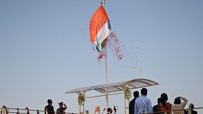 Indian Prime Minister Narendra Modi unfurls the national flag before addressing the nation from the ramparts of the Red Fort during the celebrations to mark India's 75th Independence Day in New Delhi on August 15. (AFP) Indian Prime Minister Narendra Modi unfurls the national flag before addressing the nation from the ramparts of the Red Fort during the celebrations to mark India's 75th Independence Day in New Delhi on August 15. (AFP)