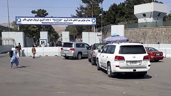 Afghan police check the cars at the entrance gate of Hamid Karzai International Airport in Kabul, Afghanistan(REUTERS)