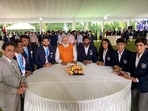 Prime Minister Narendra Modi with the Indian wrestling team during a meet with the Tokyo Olympics contingent, in New Delhi on Monday.