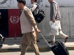 Afghans walk toward the airport in Kabul, Afghanistan on Sunday (Image used only for representative purpose)