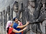 A Parsi couple prays to the guardians of the fire temple at Tardeo in Mumbai on Navroz.(Kunal Patil/Hindustan Times) A Parsi couple prays to the guardians of the fire temple at Tardeo in Mumbai on Navroz.(Kunal Patil/Hindustan Times)