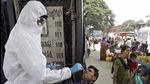 A health worker collects swab sample from a man for a Covid-19 test in Bengaluru. (PTI)
