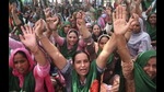 Bharatiya Kisan Union members hold a protest against the central government over agri laws in Patiala district. (PTI) Bharatiya Kisan Union members hold a protest against the central government over agri laws in Patiala district. (PTI)