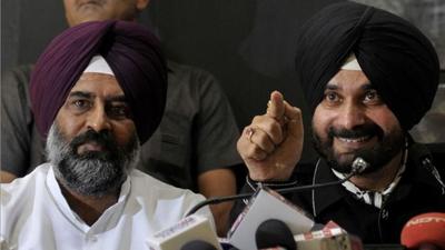 Jalandhar Cantt MLA Pargat Singh with Punjab Congress chief Navjot Singh Sidhu. Both had joined the Congress in 2016. (Ravi Kumar/HT file photo)