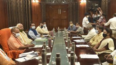 Uttar Pradesh chief minister Yogi Adityanath and assembly speaker H N Dikshit attend an all-party meeting ahead of the monsoon session of state legislature at Vidhan Bhavan in Lucknow on Monday. (PTI Photo) Uttar Pradesh chief minister Yogi Adityanath and assembly speaker H N Dikshit attend an all-party meeting ahead of the monsoon session of state legislature at Vidhan Bhavan in Lucknow on Monday. (PTI Photo)