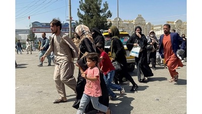 US troops reportedly fired shots into the air at Kabul airport on Monday after scores of Afghans assembled at the airport, trying to get to the plane in order to leave Afghanistan as Taliban captured the country. US troops reportedly fired shots into the air at Kabul airport on Monday after scores of Afghans assembled at the airport, trying to get to the plane in order to leave Afghanistan as Taliban captured the country.