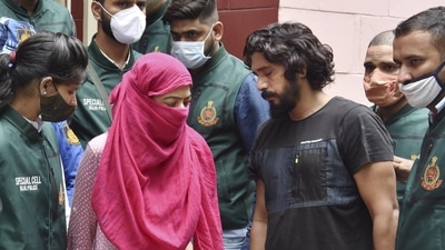 Delhi Police special cell arrested most wanted gangster Kala Jatheri with Lady Don Anuradha Chaudhary from Shahranpur (UP) produced at NFC Cell office in New Delhi (PTI Photo) Delhi Police special cell arrested most wanted gangster Kala Jatheri with Lady Don Anuradha Chaudhary from Shahranpur (UP) produced at NFC Cell office in New Delhi (PTI Photo)