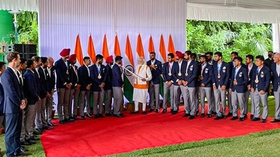 Prime Minister Narendra Modi with Tokyo Olympics bronze medalist, men's hockey team during a felicitation ceremony at PM's residence in New Delhi on August 16. (PTI) Prime Minister Narendra Modi with Tokyo Olympics bronze medalist, men's hockey team during a felicitation ceremony at PM's residence in New Delhi on August 16. (PTI)