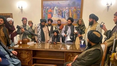 Taliban fighters take control of the Afghan presidential palace in Kabul after president Ashraf Ghani fled the country.&nbsp; (AP Photo)